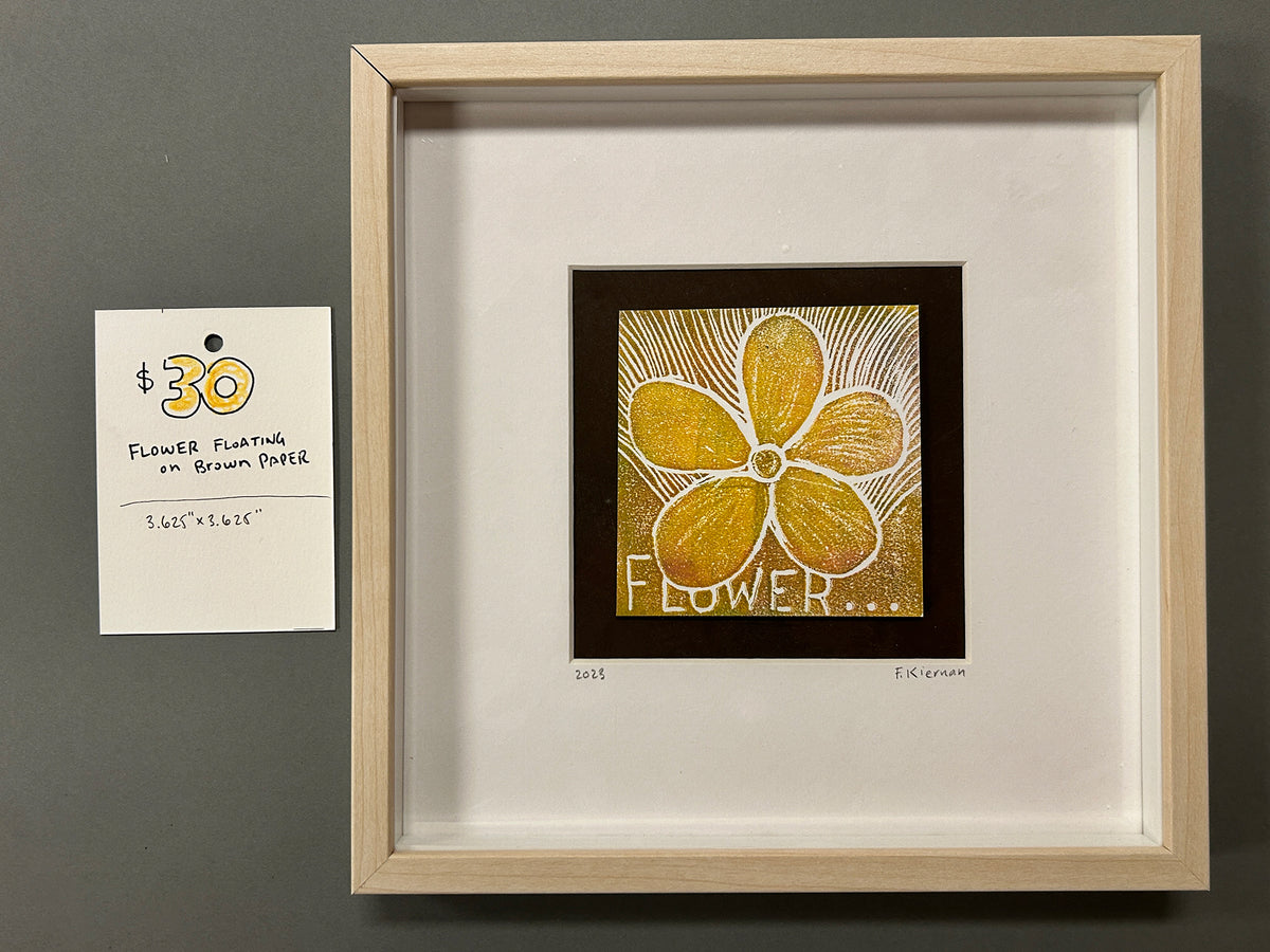 Yellow Flower Floating on Brown Paper