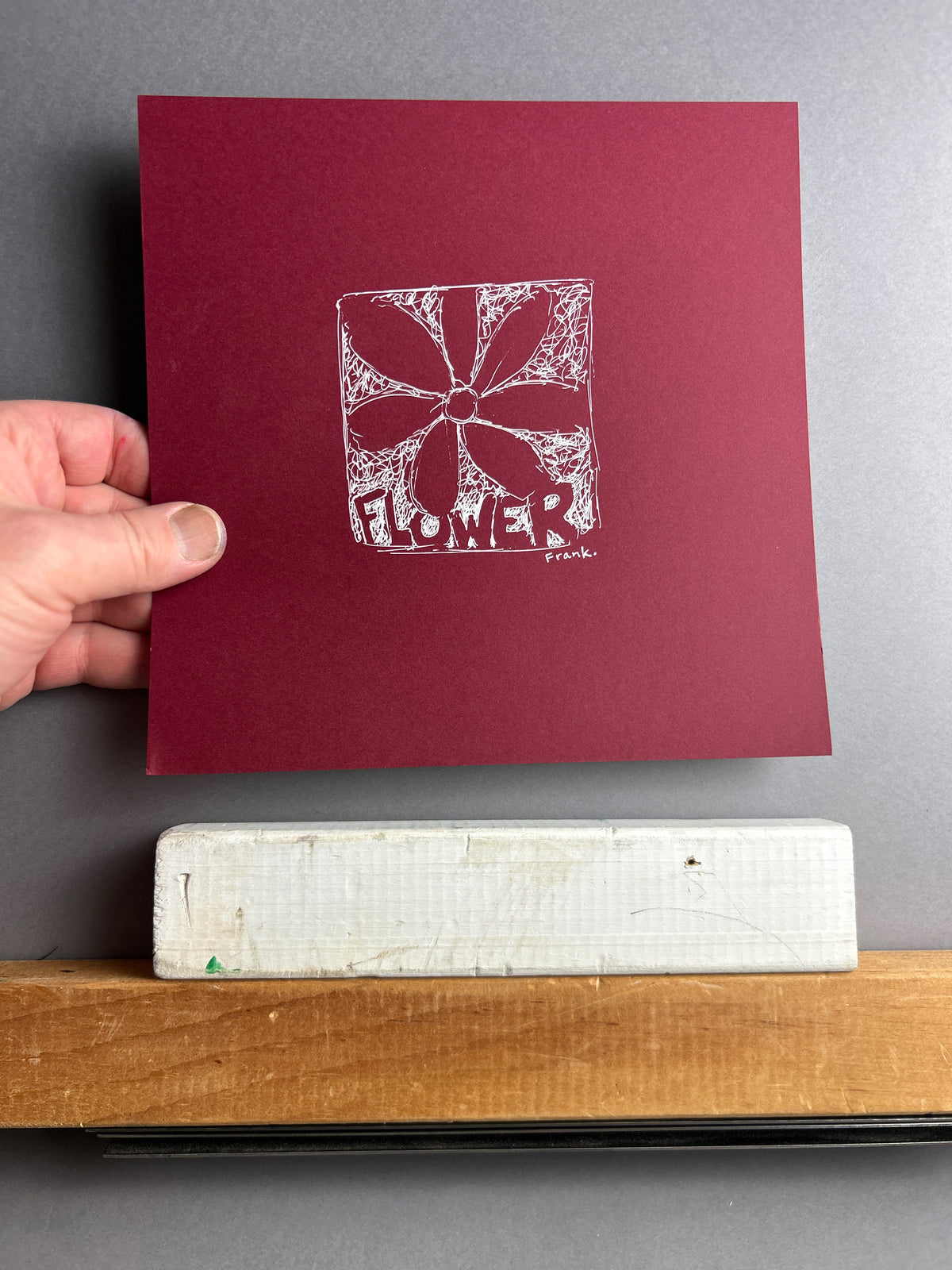 Flower White Ink Drawing on Dark Red